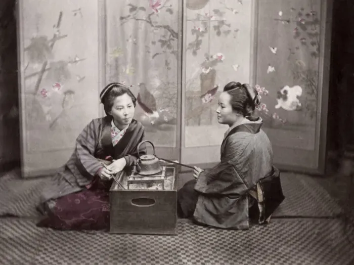 Framed Print : c. 1880s Japan - geishas with a kettle and stove Framed Print : c. 1880s Japan - geishas with a kettle and stove