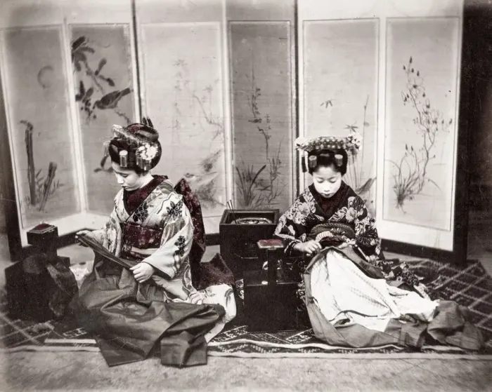 Framed Print : c. 1880s Japan - geishas with sewing clothes Framed Print : c. 1880s Japan - geishas with sewing clothes