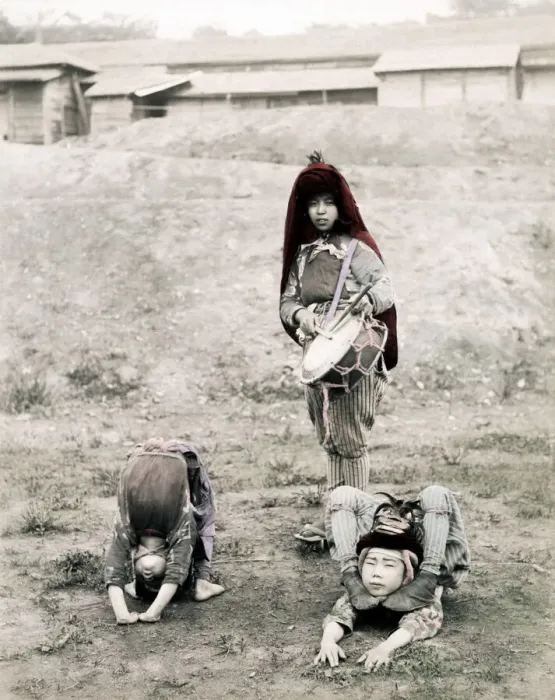 Framed Print : c. 1880s Japan - street performers, acrobats Framed Print : c. 1880s Japan - street performers, acrobats