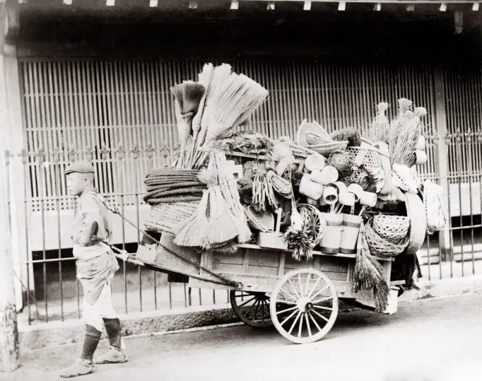 Framed Print : c. 1880s Japan - street vendor pulling his cart Framed Print : c. 1880s Japan - street vendor pulling his cart