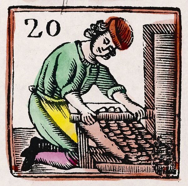 C17 BAKER. A baker rolls out his dough using an early type of rolling pin, Date