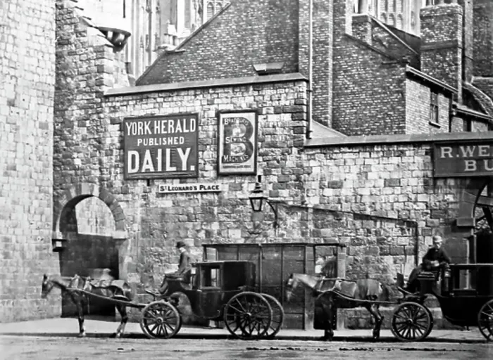Framed Print : Cabs waiting at Bootham Bar, York, early 1900s Framed Print : Cabs waiting at Bootham Bar, York, early 1900s
