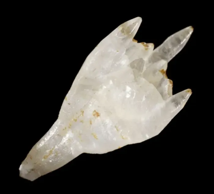 Framed Print : Calcite. A specimen of calcite, displaying a distorted hollow crystal with Framed Print : Calcite. A specimen of calcite, displaying a distorted hollow crystal with