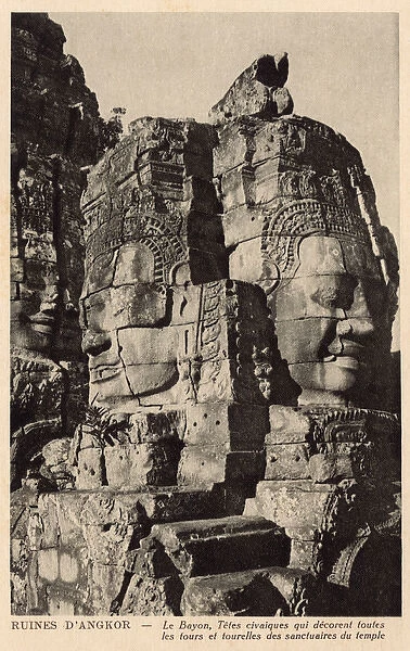 Cambodia - Angkor Wat - Two massive carved heads