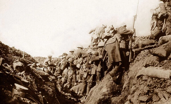 Canadian battalion leaving a trench going over