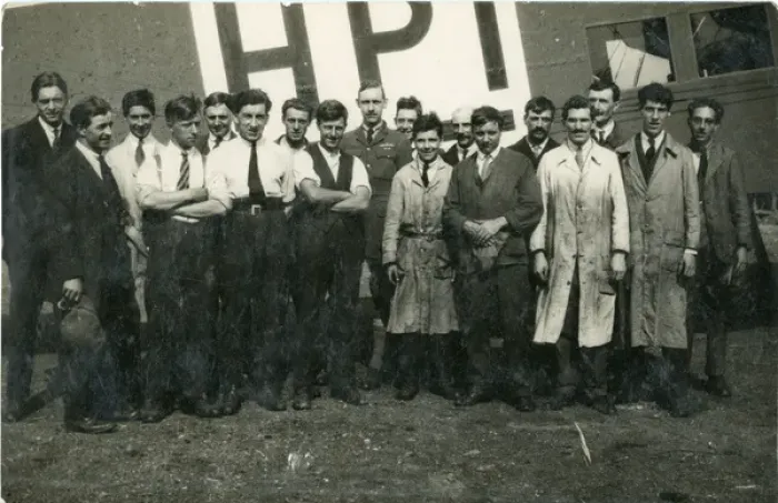 Framed Print : Capt G. T. R. Hill (centre) with a group of mechanics in f? Framed Print : Capt G. T. R. Hill (centre) with a group of mechanics in f?