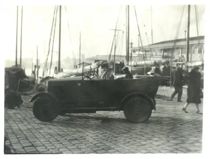 Framed Print : Car at the docks with masts in the background Framed Print : Car at the docks with masts in the background
