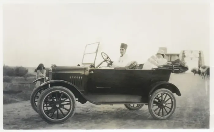 Framed Print : Car with driver, mother and baby, Middle East Framed Print : Car with driver, mother and baby, Middle East