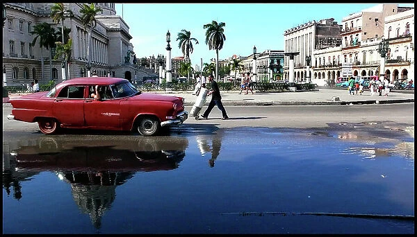 Car and reflection, central Havana, Cuba