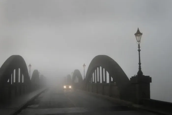 Framed Print : A car in thick fog on the concrete bridge over the River Dee Framed Print : A car in thick fog on the concrete bridge over the River Dee