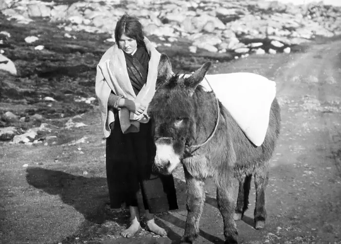 Framed Print : Carrying flour, Gorumna, West of Ireland, early 1900s Framed Print : Carrying flour, Gorumna, West of Ireland, early 1900s