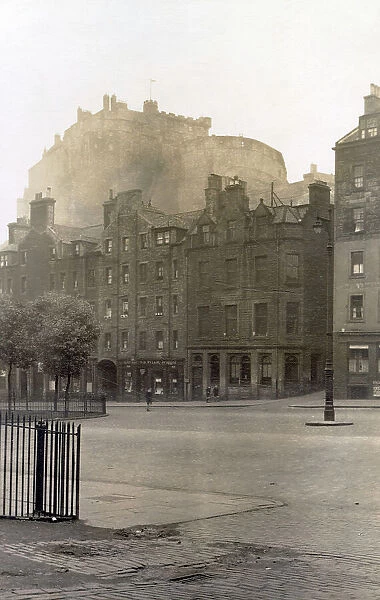 The Castle, viewed from the SE, with the Grassmarket, Edinburgh, Scotland Date: 1930s