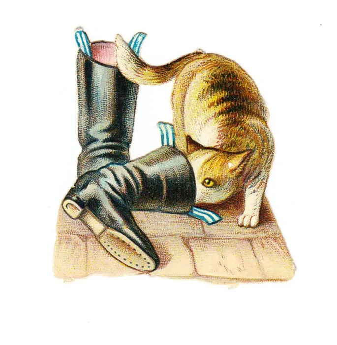 : Cat investigating boots on a Victorian scrap : Cat investigating boots on a Victorian scrap