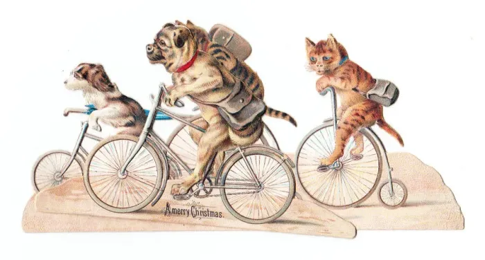 Framed Print : Cats and dogs on bicycles on a cutout Christmas card Framed Print : Cats and dogs on bicycles on a cutout Christmas card