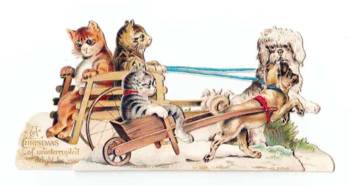 Framed Print : Cats and dogs riding carts on a cutout Christmas card Framed Print : Cats and dogs riding carts on a cutout Christmas card