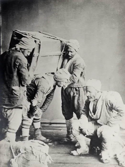 Framed Print : Caucasus Georgia Tiflis Tblisi - porters carrying heavy loa