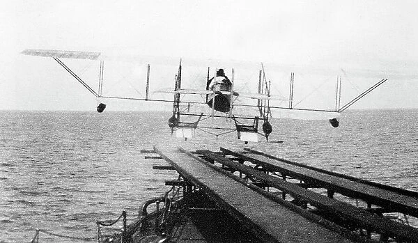 Caudron G11 biplane taking off from HMS Hermes early 1900s