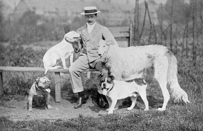 Framed Print : Cecil Aldin with four dogs in Bedford Park, West London