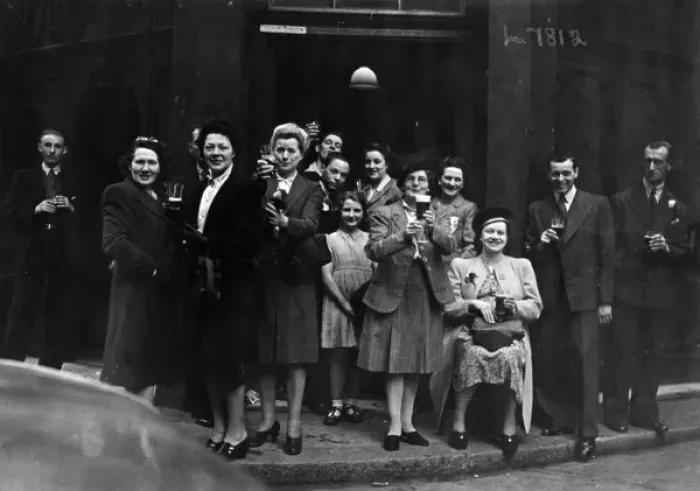Framed Print : Cheers. A group of people raise their glasses of beer in a toast outside Framed Print : Cheers. A group of people raise their glasses of beer in a toast outside
