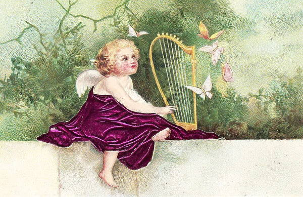 Cherub playing a harp on a greetings postcard