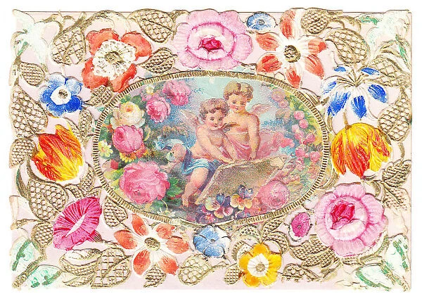 Cherubs with flowers on a paper lace greetings card