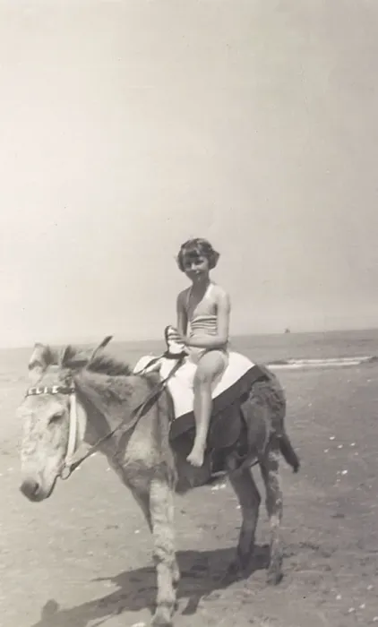 Framed Print : Child riding a seaside donkey Framed Print : Child riding a seaside donkey