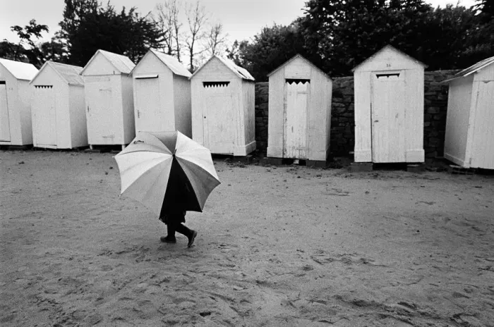Framed Print : Child with umbrella, Brittany, France Framed Print : Child with umbrella, Brittany, France