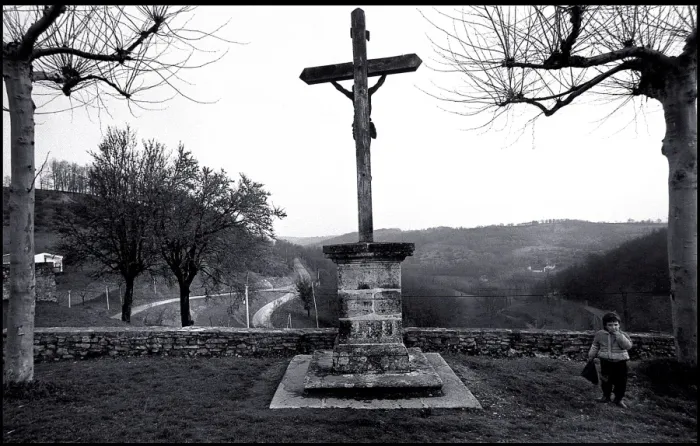 Framed Print : Child at village memorial, France Framed Print : Child at village memorial, France