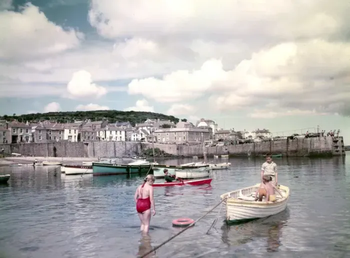 Framed Print : Children and boats in Mousehole Harbour, Cornwall Framed Print : Children and boats in Mousehole Harbour, Cornwall
