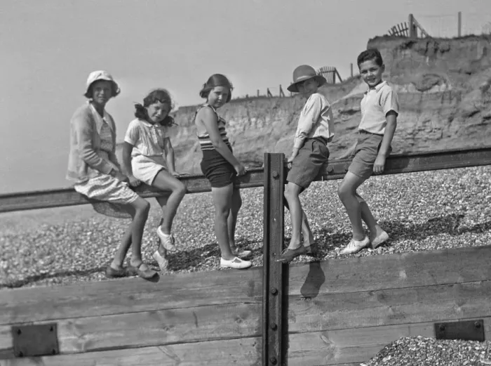 Framed Print : Five children on a breakwater at the seaside Framed Print : Five children on a breakwater at the seaside