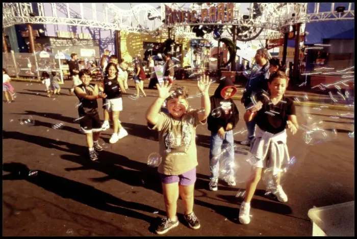 Framed Print : Children chasing soapbubbles Santa Monica beach, USA Framed Print : Children chasing soapbubbles Santa Monica beach, USA