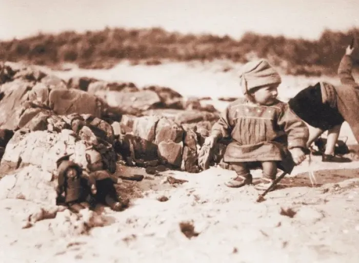 Framed Print : Two children with dolls on a beach, Scotland Framed Print : Two children with dolls on a beach, Scotland