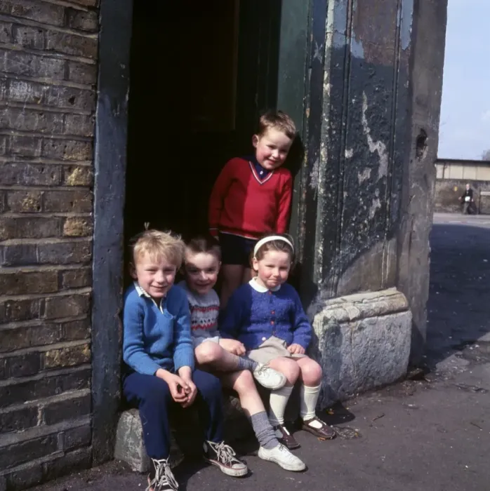 Framed Print : Children on doorstep in a Balham street, SW London Framed Print : Children on doorstep in a Balham street, SW London