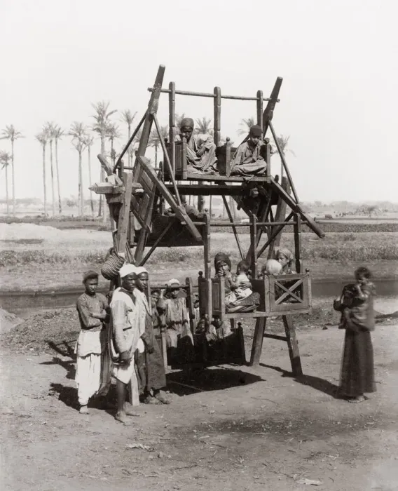 Framed Print : Children on an early funfair ride, Egypt, c. 1890 Framed Print : Children on an early funfair ride, Egypt, c. 1890