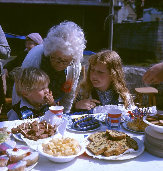 Children and elderly lady at a street party