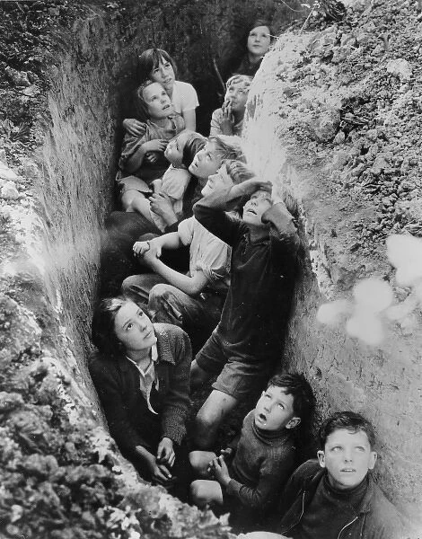 Children in an English bomb shelter. British Information Ser