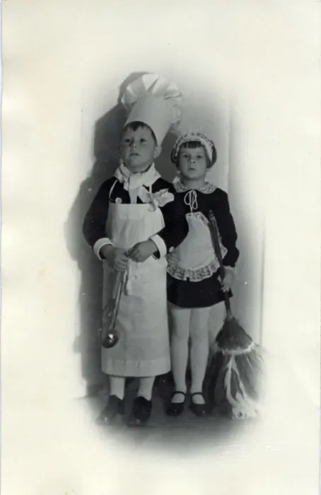 Framed Print : Two children in fancy dress; the little boy is dressed as a chef while a little girl Framed Print : Two children in fancy dress; the little boy is dressed as a chef while a little girl