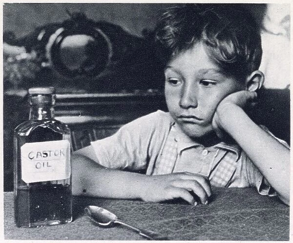 Children were force-fed spoonfuls of castor oil for treatment of constipation. Date: 1939