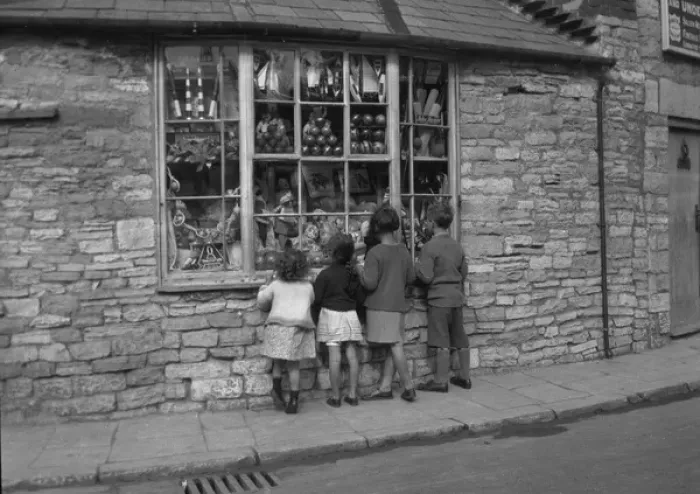 Framed Print : Four children gazing through shop window Framed Print : Four children gazing through shop window