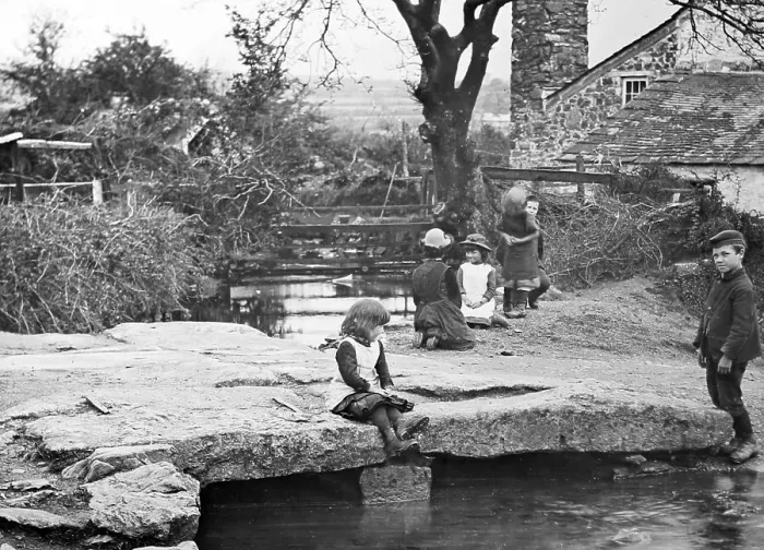 Framed Print : Children playing on a clapper bridge on Dartmoor Framed Print : Children playing on a clapper bridge on Dartmoor