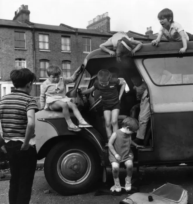 Framed Print : Children playing with a van in a Balham street, SW London Framed Print : Children playing with a van in a Balham street, SW London