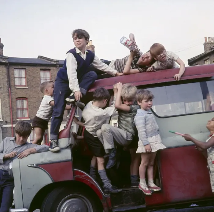 Framed Print : Children playing with a van in a Balham street, SW London Framed Print : Children playing with a van in a Balham street, SW London