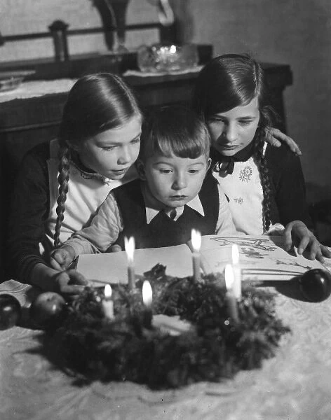 Three Children Reading
