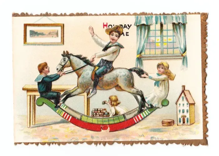 Framed Print : Children with rocking horse on a greetings card Framed Print : Children with rocking horse on a greetings card