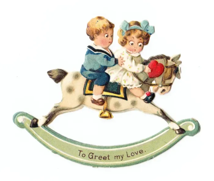 Framed Print : Two children on a rocking horse on a movable Valentine card Framed Print : Two children on a rocking horse on a movable Valentine card