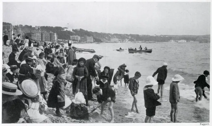 Framed Print : Children on the sands in a wide assortment of clothing Date: 1905 Framed Print : Children on the sands in a wide assortment of clothing Date: 1905