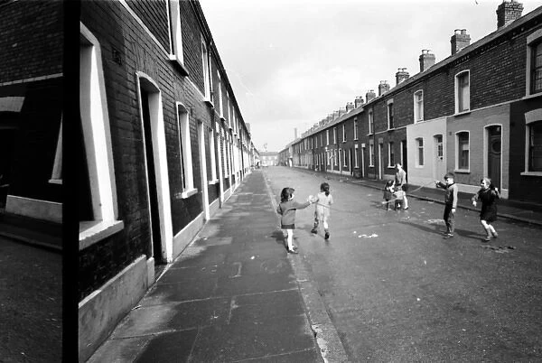 Children skipping in a street, Belfast, Northern Ireland