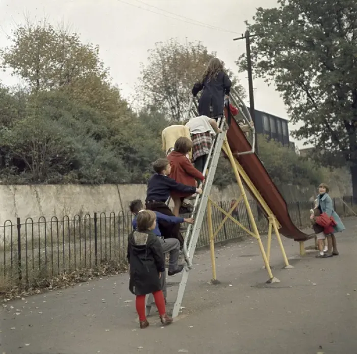 Framed Print : Children on a slide in a park Framed Print : Children on a slide in a park