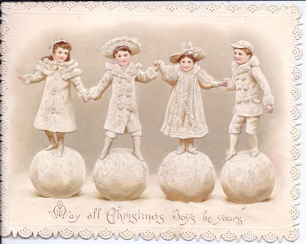 Four children stand on large snowballs on a Christmas card
