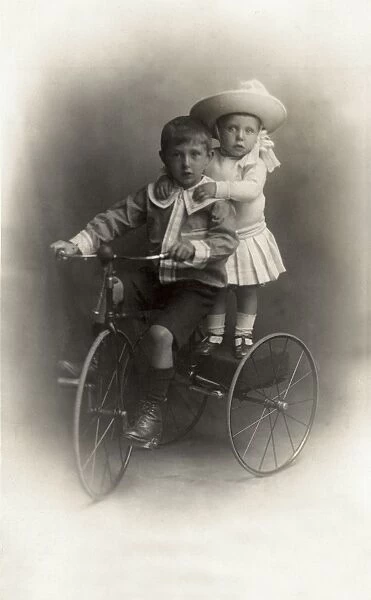 Children on a tricycle